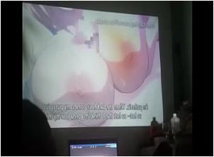 Guy masturbating Infront of a hentai video